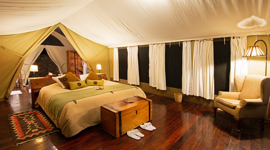 Karen Blixen Camp Mara North overlooking the Mara River and savannah plains in Kenya